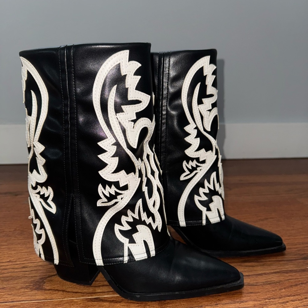 Black and White Heeled Boots with Intricate Design